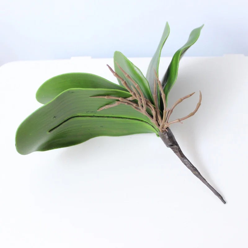 Realistische künstliche Orchideenblatt-Anordnung