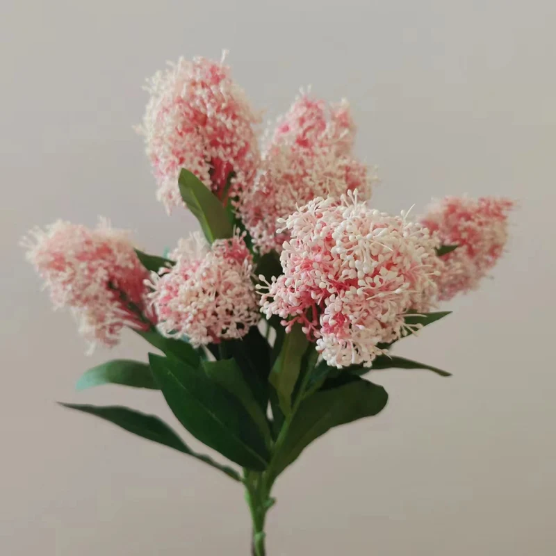 Lebensechte Blumenstängelarrangement