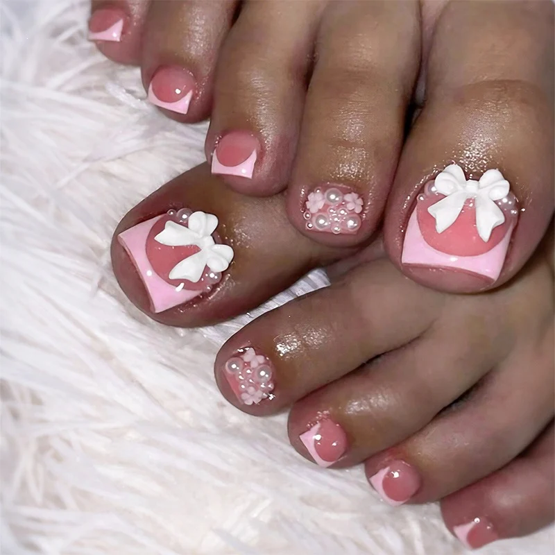 Kunstnagelset mit romantischen Schleifen-Design Karnz