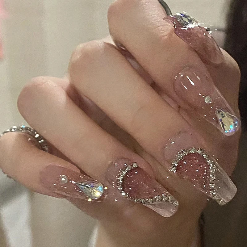 Künstlerisches Press-On-Nagelset mit glitzernden Sternakzenten Karnz