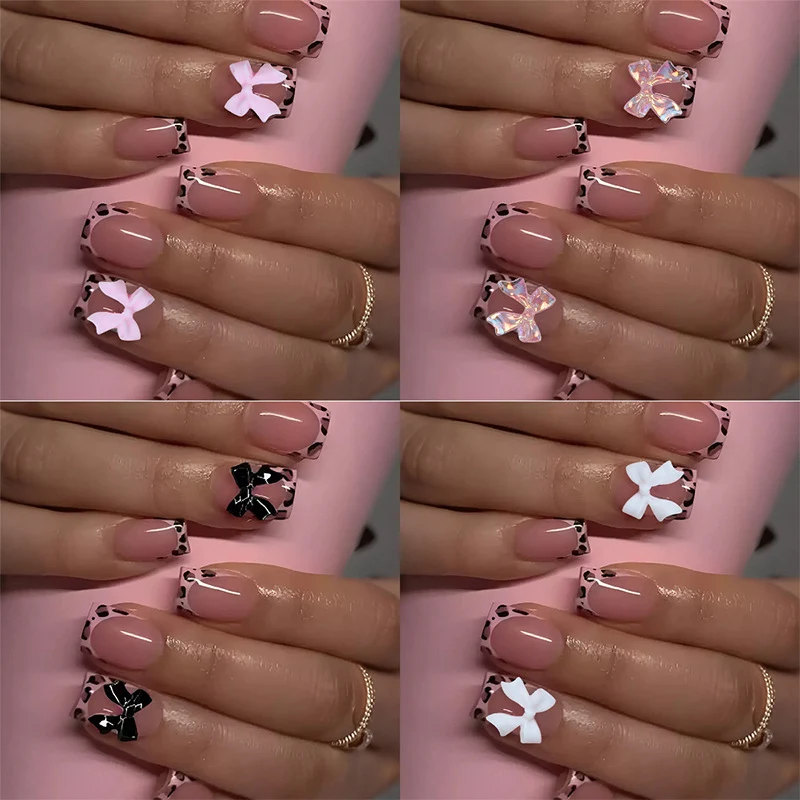 Kunstnagelset mit niedlichen Schleifen- und Blütenmotiven Karnz