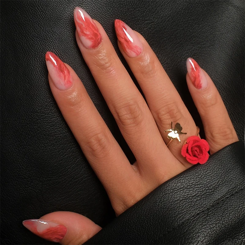 Kunstnagelset mit marmoriertem Design Karnz