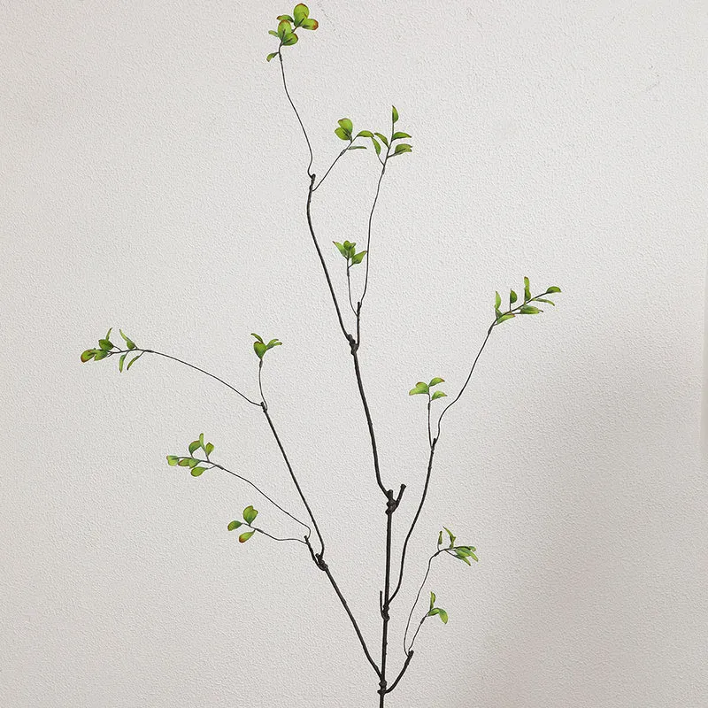Künstlicher Blütenzweig mit lebendigen orangefarbenen Blüten Karnz