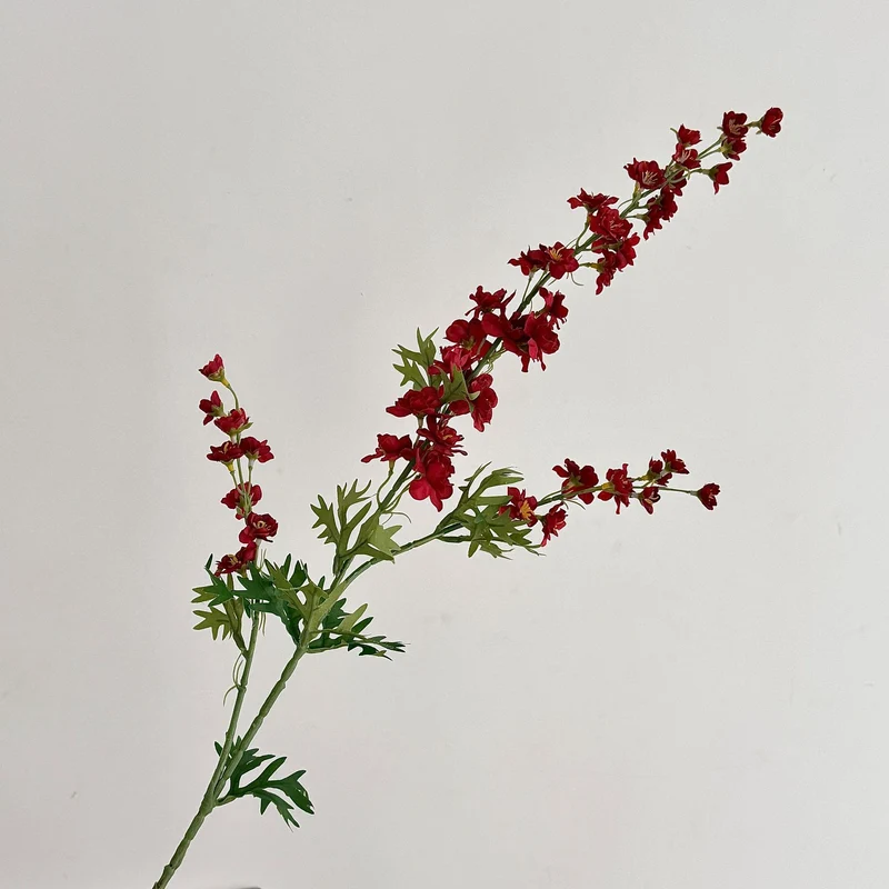 Künstlicher Blütenzweig mit detailreichen roten Blüten Karnz