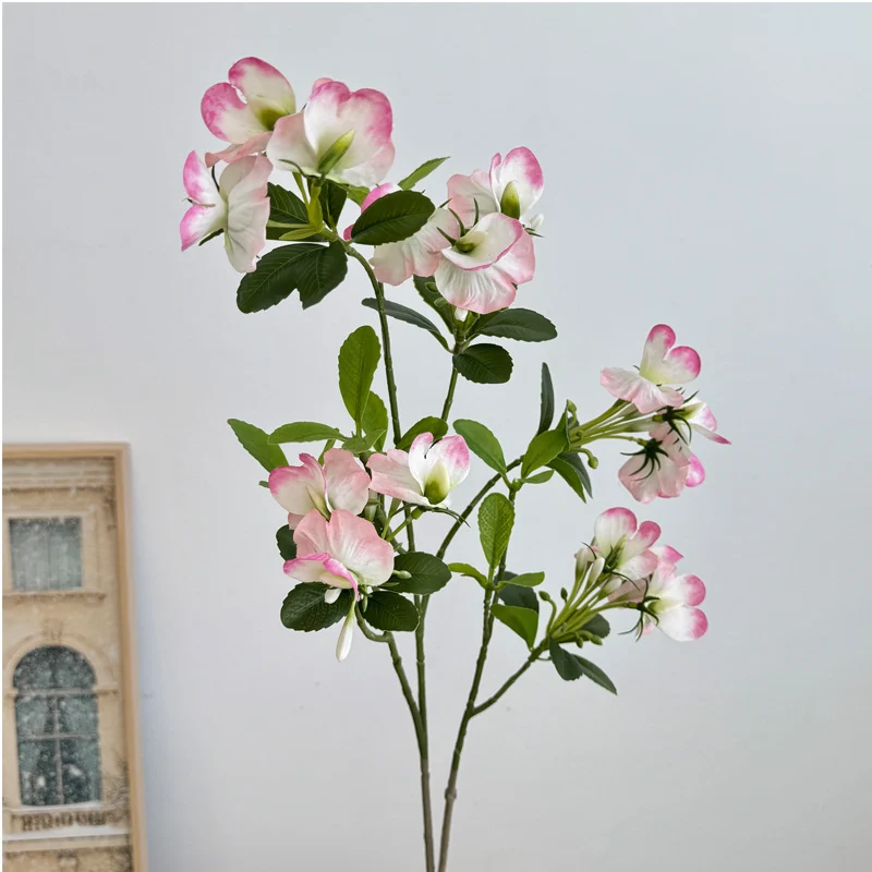 Künstlicher Blütenzweig mit lebhaften rosa Blüten Karnz