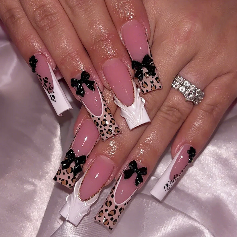 Kunstnagelset mit kreativen Schleifen- und Tiermotiven Karnz