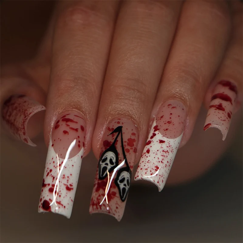 Kunstnagelset mit kreativen blutigen Spritz-Design Karnz