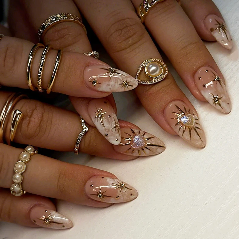 Kunstnagelset mit funkelnden Sternen- und Glitzermotiven Karnz