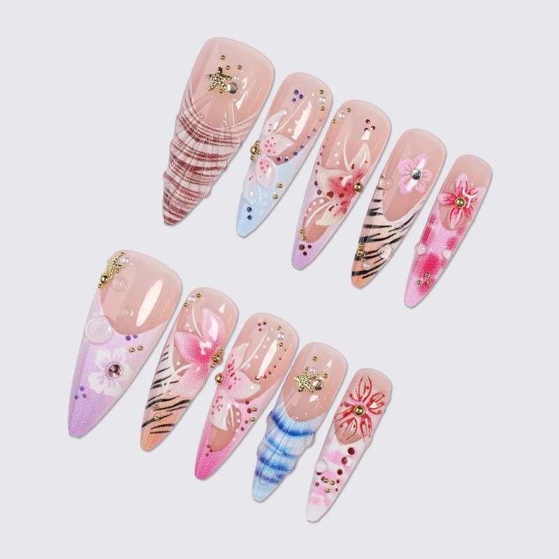 Kunstnagelset mit floralen und kreativen Designs Karnz