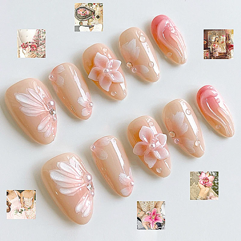 Kunstnagelset mit floralen Motiven und Strassverzierungen Karnz