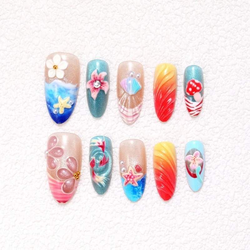 Kunstnagelset mit floralen Designs und glitzernden Akzenten Karnz
