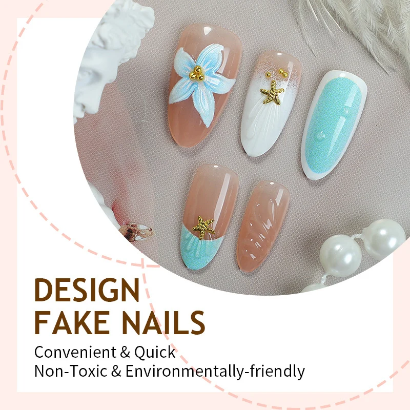 Kunstnagelset mit floralem Design und kunstvollen Verzierungen Karnz