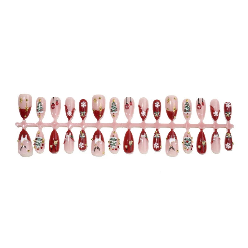 Kunstnagelset mit festlichen Weihnachtsmotiven und funkelnden Akzenten Karnz