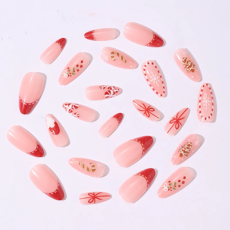 Kunstnagelset mit festlichen Motiven und Glitzerakzenten Karnz