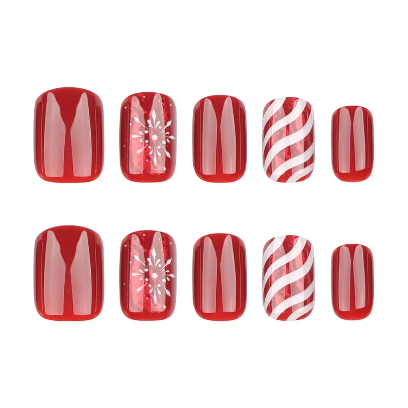 Kunstnagelset mit festlichen Designs und Glitzerakzenten Karnz