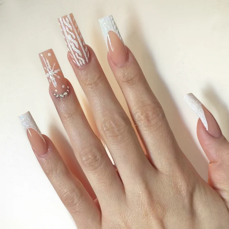 Kunstnagelset mit festlichen Designs Karnz
