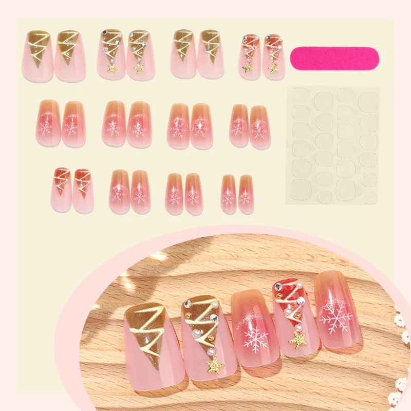 Kunstnagelset mit festlichem Weihnachtsmotiven und Glitzerapplikationen Karnz