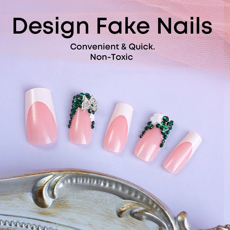 Kunstnagelset mit eleganten Strassverzierungen und floralem Design Karnz