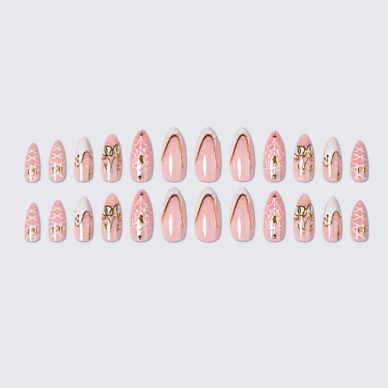 Kunstnagelset mit eleganten Spinnenmotiven und goldenen Akzenten Karnz