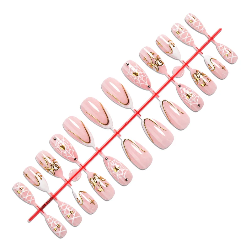 Kunstnagelset mit eleganten Spinnenmotiven und goldenen Akzenten Karnz