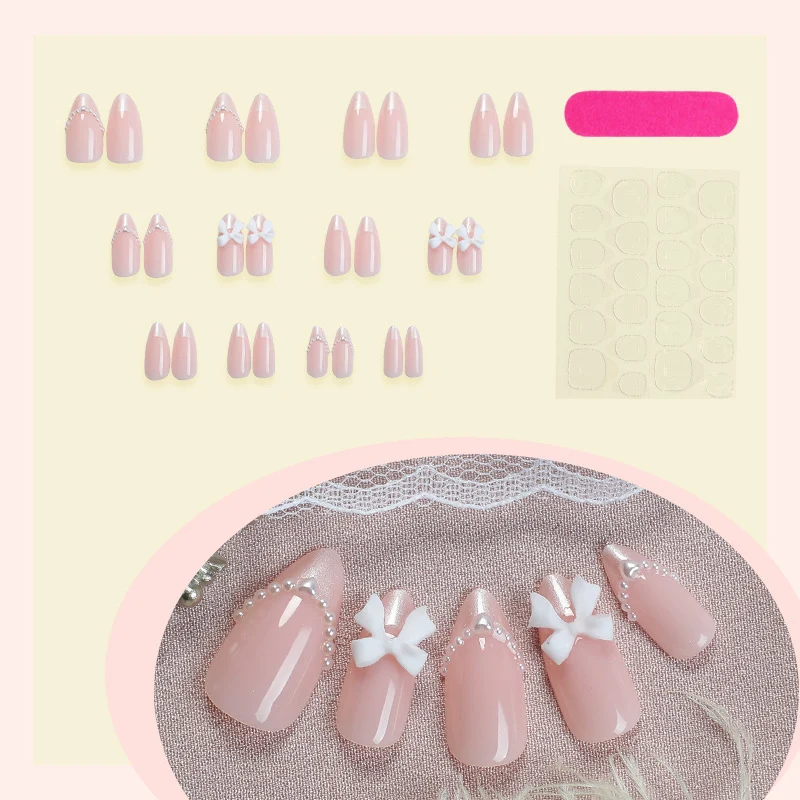 Kunstnagelset mit eleganten Schleifen- und Perlverzierungen Karnz