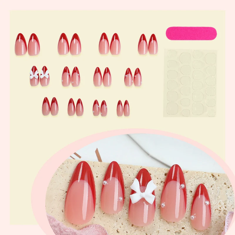 Kunstnagelset mit eleganten Schleifen und Glitzerakzenten Karnz