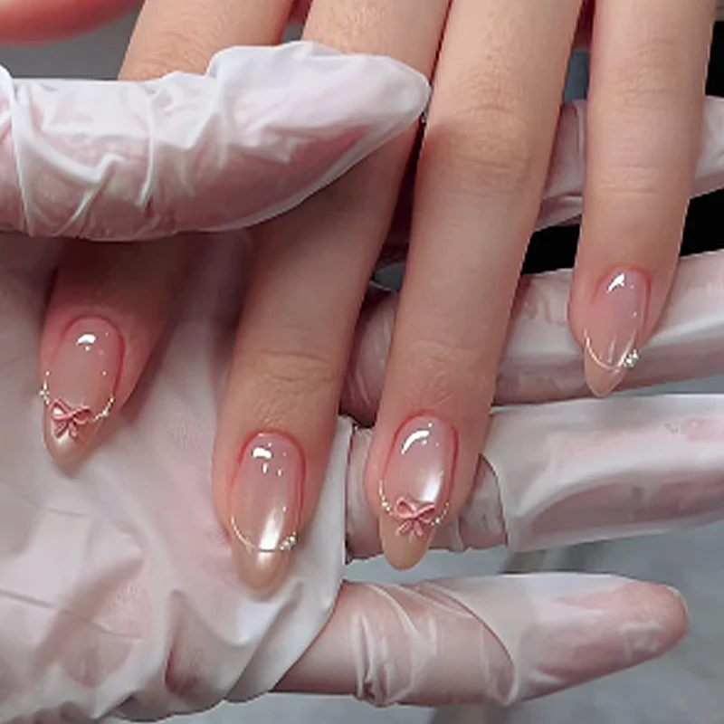 Kunstnagelset mit eleganten Schleifen- und Glitzerakzenten Karnz 1789119022