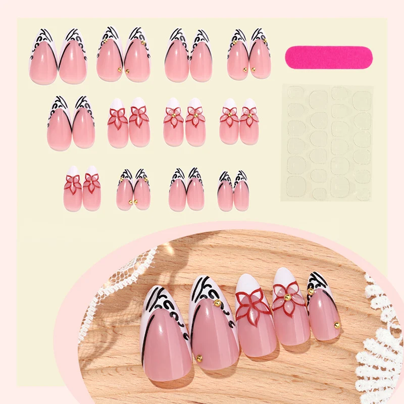 Kunstnagelset mit eleganten Schleifen- und Blütenverzierungen Karnz