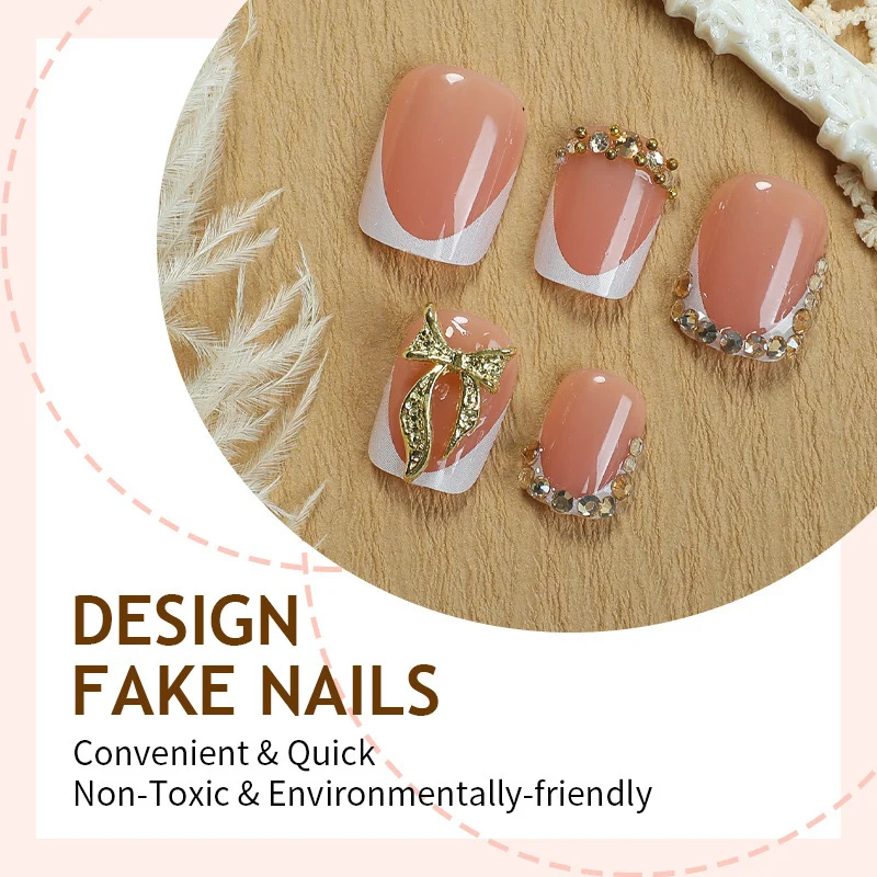 Kunstnagelset mit eleganten Glitzer- und Blumenverzierungen Karnz