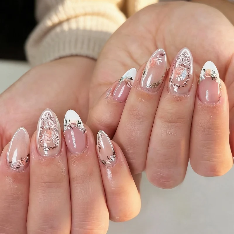 Kunstnagelset mit eleganten Floral- und Glitzermotiven Karnz