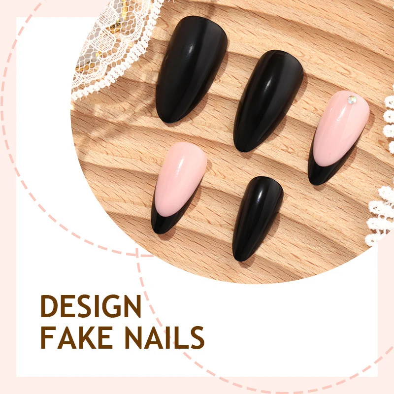 Kunstnagelset mit elegantem Schwarz-Pink Design und strassbesetzten Akzenten Karnz