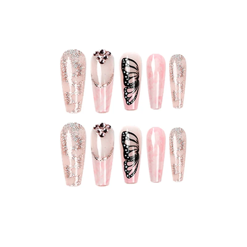 Glamouröse Nagelverlängerungen mit wunderschönen Schmetterlingsmotiven und Glitzerakzenten Karnz