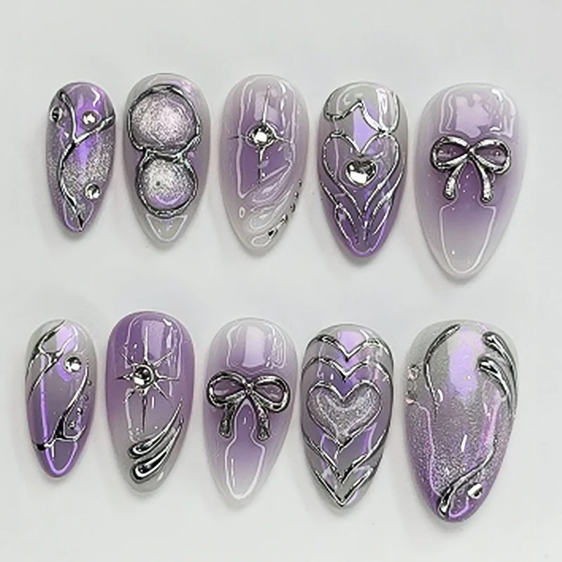 Kunstnagelset mit elegantem Ombre-Design und filigranen Verzierungen Karnz