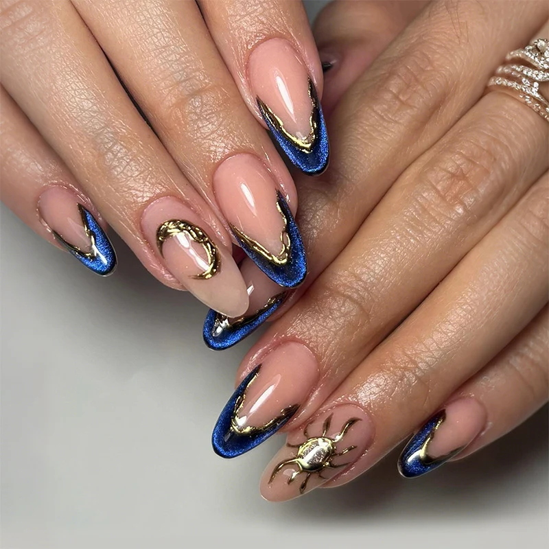 Kunstnagelset mit elegantem gold-blauen Design Karnz