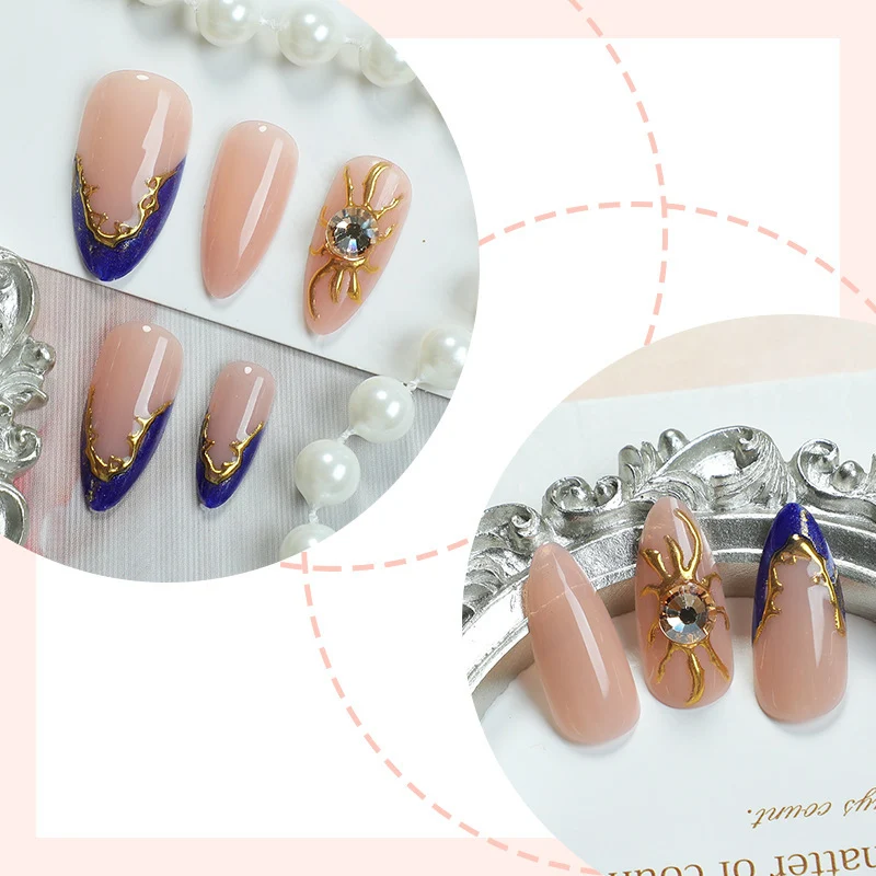 Kunstnagelset mit elegantem gold-blauen Design Karnz