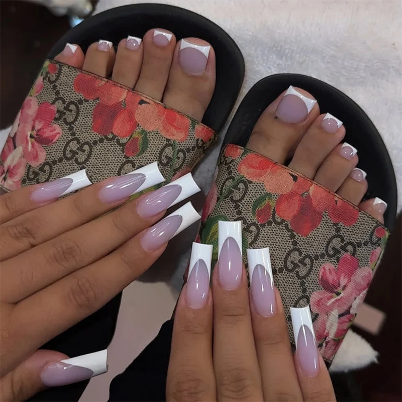 Kunstnagelset mit elegantem French-Tip Design und modernen Akzenten Karnz