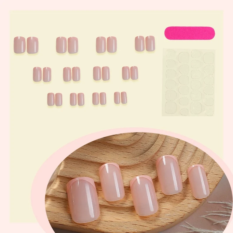 Kunstnagelset mit elegantem French Design und funkelnden Akzenten Karnz