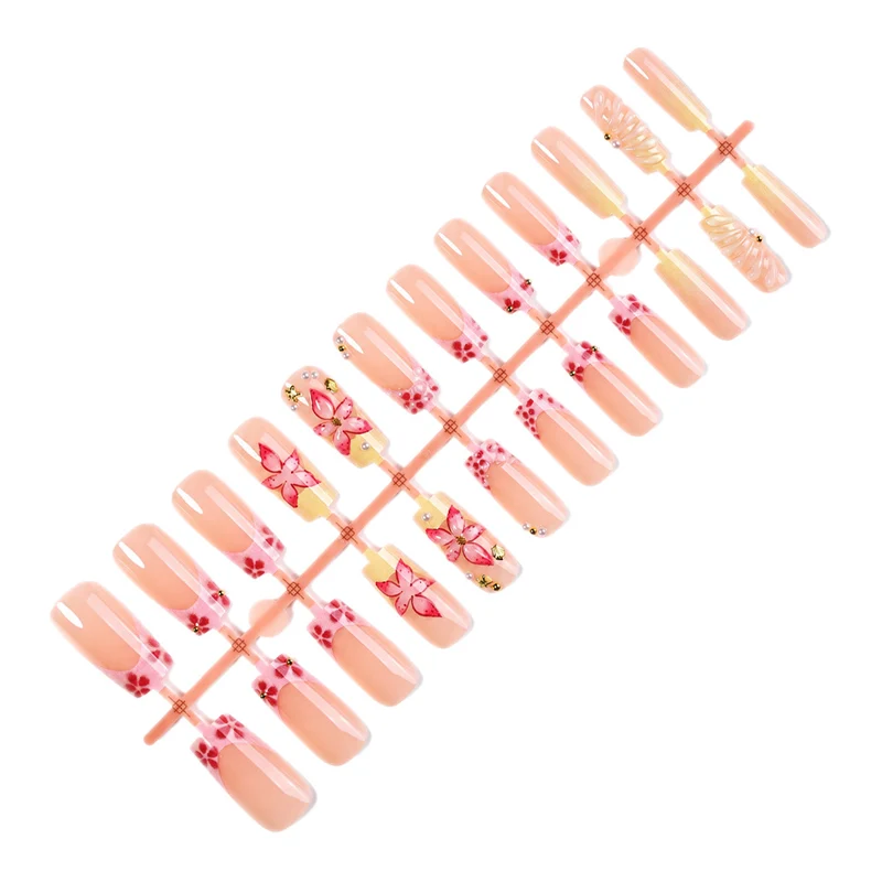 Kunstnagelset mit elegantem Blüten- und Glitzerdesign Karnz