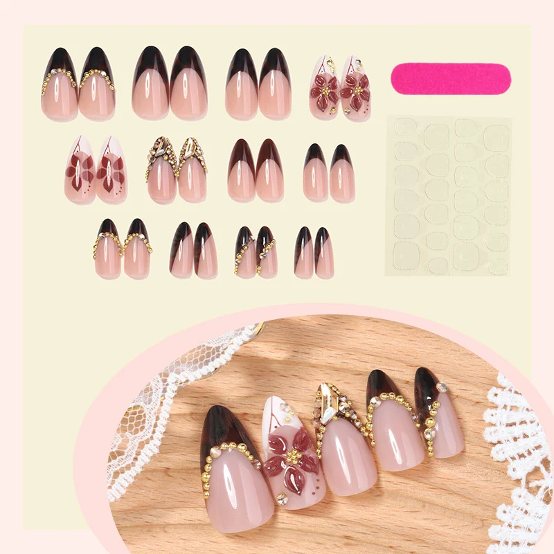 Kunstnagelset mit elegantem Blumen- und Glitzerakzent Karnz