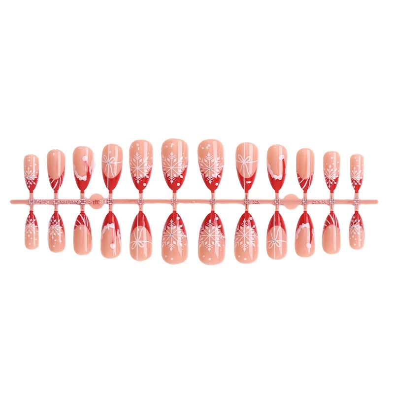 Kreatives Kunstnagelset mit festlichem Schneeflocken-Design Karnz