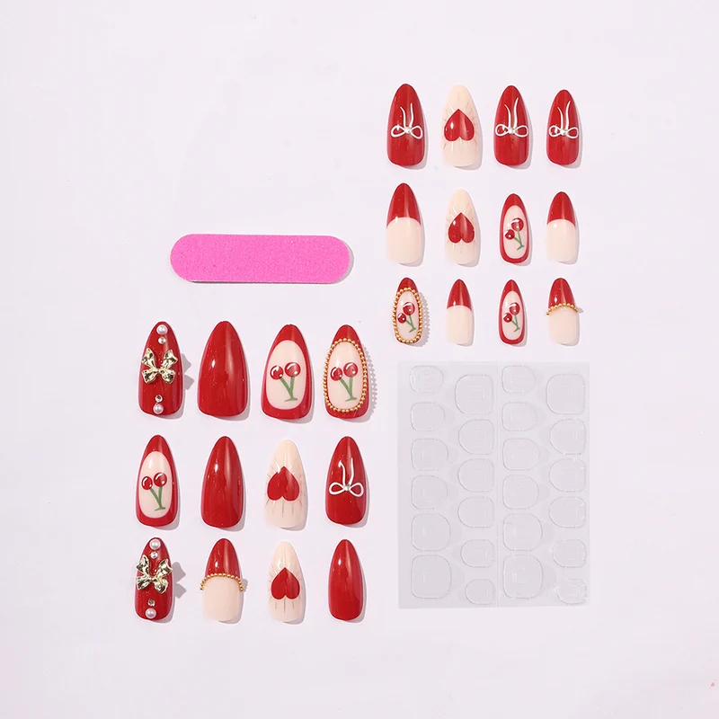 Kreatives Kunstnagelset mit eleganten Herz- und Schleifenmotiven Karnz