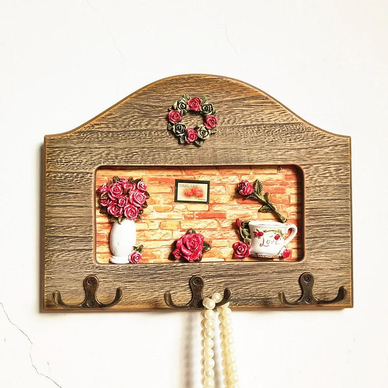Dekorativer floral Wandhakenregal