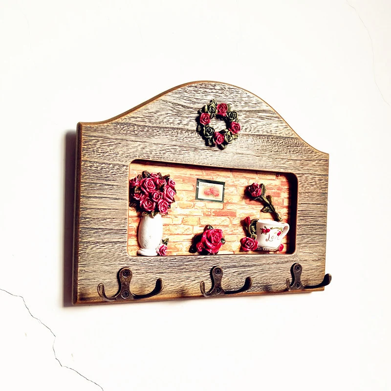 Dekorativer floral Wandhakenregal