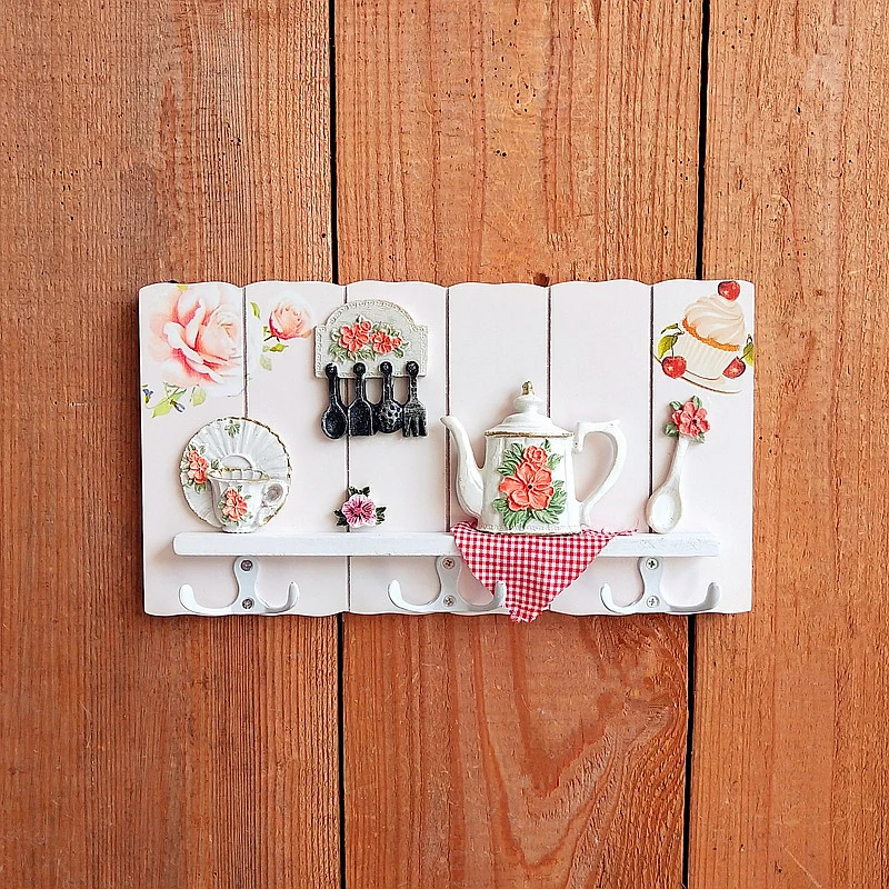 Dekorativer floral Wandhakenregal