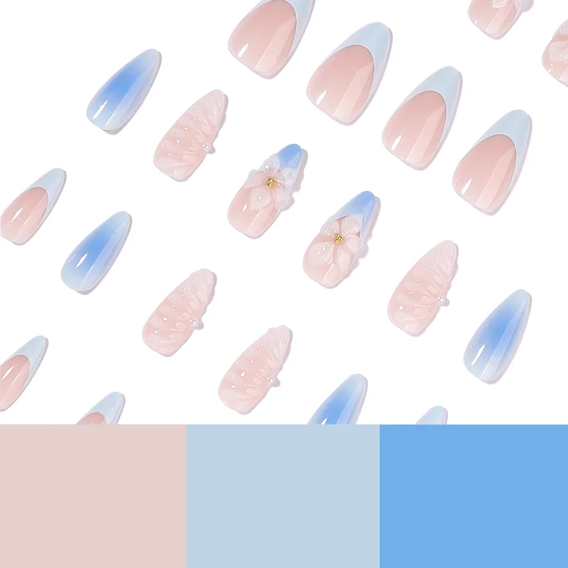 Stiletto-Nägel mit floralem Design und Glitzer Akzenten Karnz