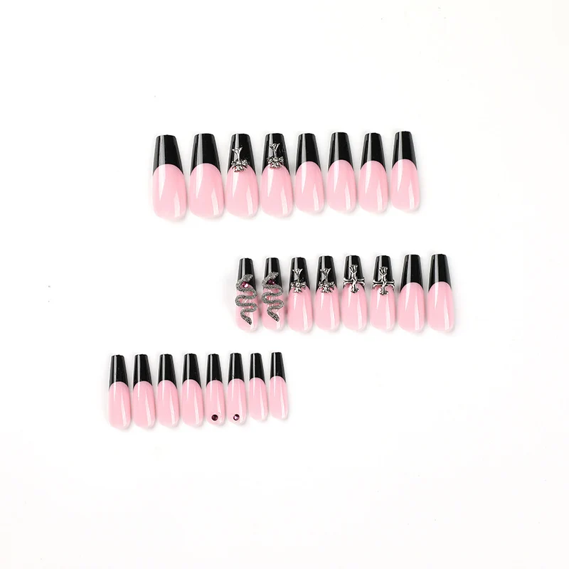 Kunstvolle Stiletto-Nägel mit Glitzer-Akzenten und Kreativdesign Karnz