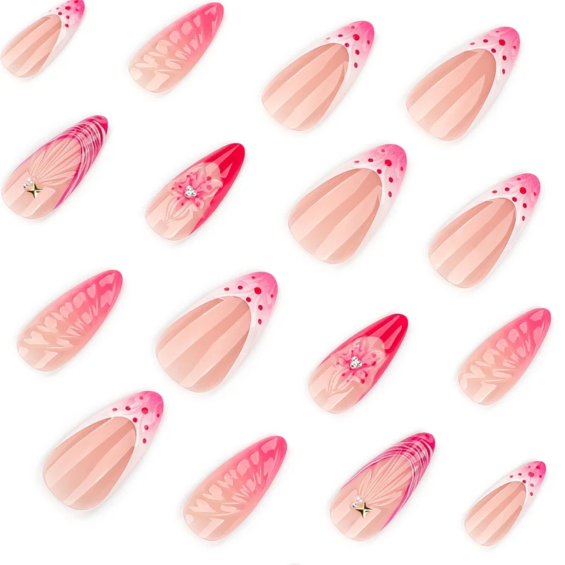 Kunstvolle Stiletto-Nägel mit floralem Design und Glitzerakzenten Karnz