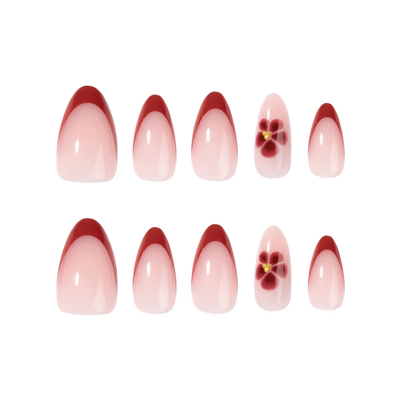 Elegante und kunstvoll gestaltete Stiletto-Nägel mit Blumendesign Karnz
