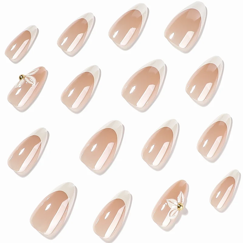Kunstvolle Stiletto-Nägel mit elegantem Blumendesign Karnz