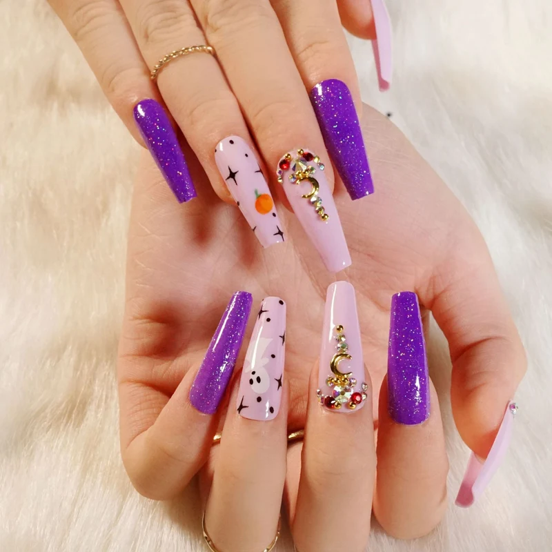 Kunstvolle Nagelverlängerungen mit kreativen Augen-Design Karnz